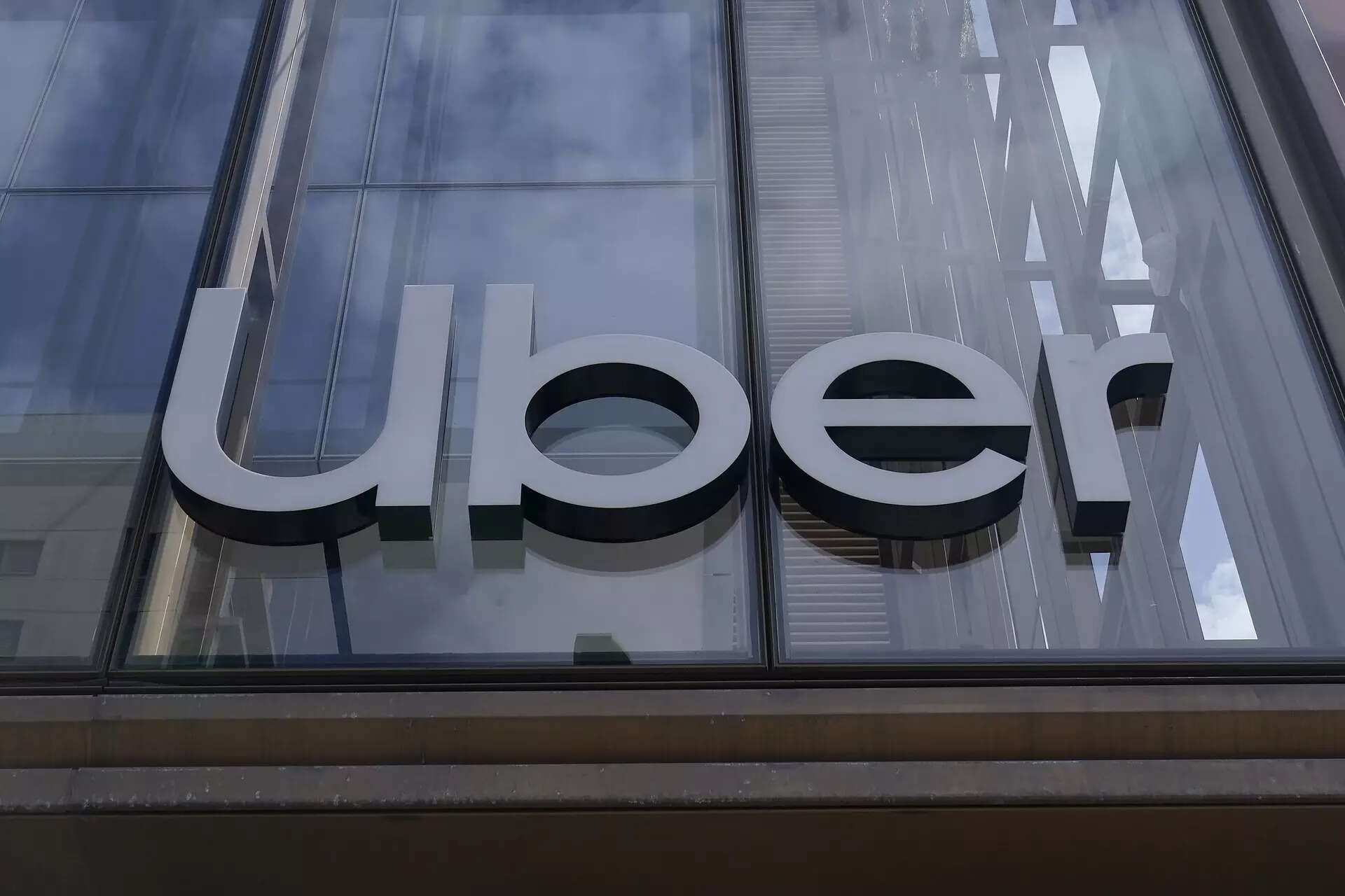 <p>An Uber sign is displayed at the company's headquarters in San Francisco, Monday, Sept. 12, 2022. </p>