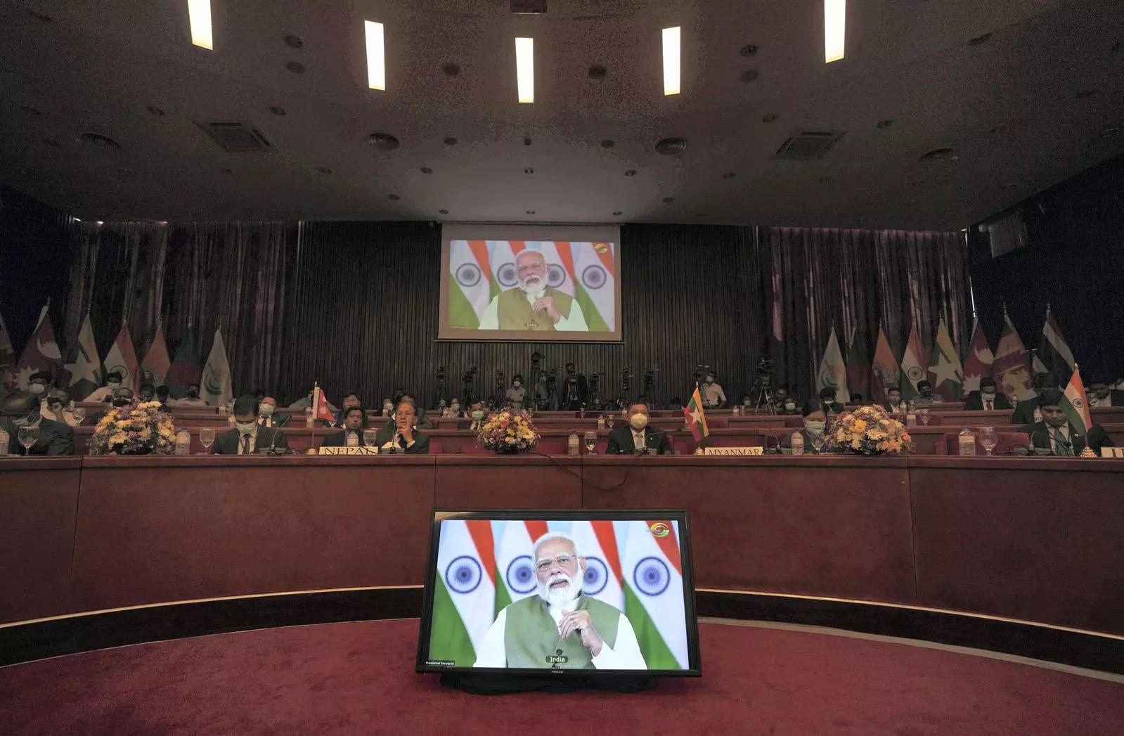 <p>Members listen to a virtual speech by Indian Prime Minister Narendra Modi at the fifth Bay of Bengal Initiative for Multi-Sectoral Technical and Economic Cooperation (BIMSTEC) leader's summit in Colombo, Sri Lanka. The umbrella organization of seven Bay of Bengal nations says its members must urgently leverage geographical advantage and other resources to address their post-pandemic vulnerabilities and collectively strengthen resilience to face future calamities. AP/PTI(</p>