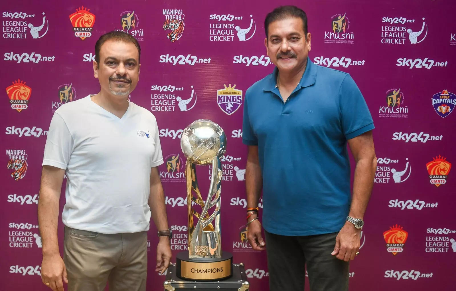 <p>Kolkata: Legends League Cricket Co-founder & CEO Raman Raheja and former cricketer & Legends League Cricket Commissioner Ravi Shastri pose with the tournament's trophy, in Kolkata. (PTI Photo)(</p>