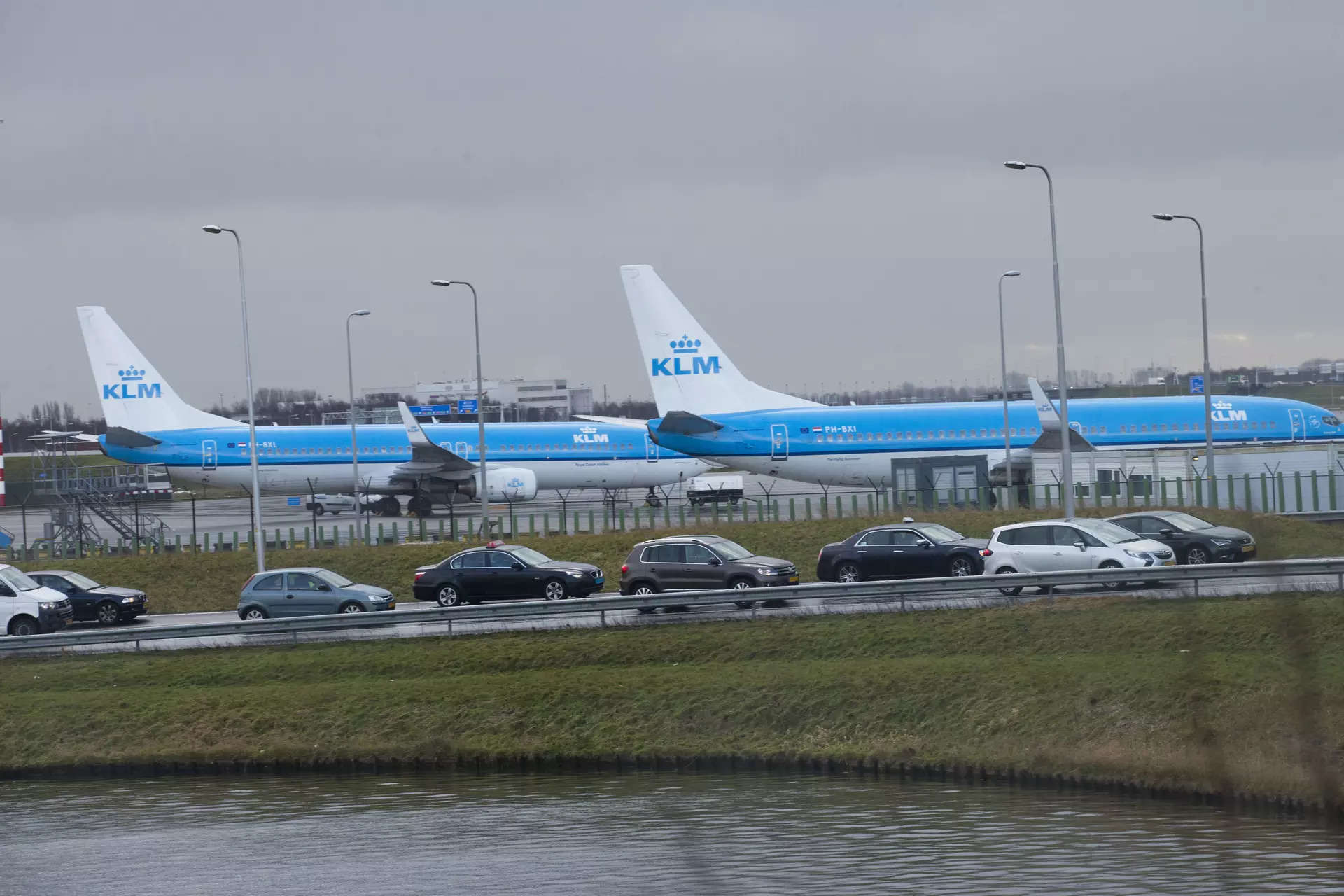 <p>FILE - KLM airplanes sit in Schiphol Airport near Amsterdam, Netherlands, on Jan. 18, 2018. Appeals judges in Amsterdam on Friday, July 7, 2023, ruled that the Dutch government can order Schiphol Airport, one of Europe's busiest aviation hubs, to reduce the number of flights from 500,000 per year to 460,000. The ruling at Amsterdam Court of Appeal overturned a lower court's decision in April that the government did not follow the correct procedure when it called on Schiphol last year to reduce flight numbers. (AP Photo/Peter Dejong)</p>