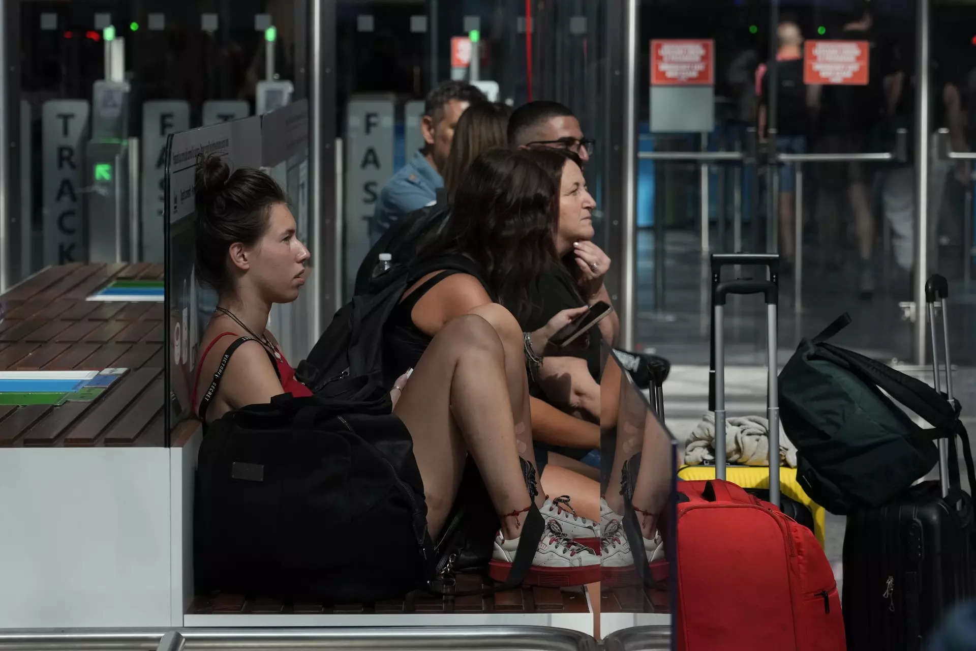 <p>Passengers wait for their flights during a nationwide strike of airports ground staff, and check-in services at Rome's Fiumicino International airport in Fumicino, Italy, Saturday, July 15, 2023. (AP Photo/Gregorio Borgia)</p>