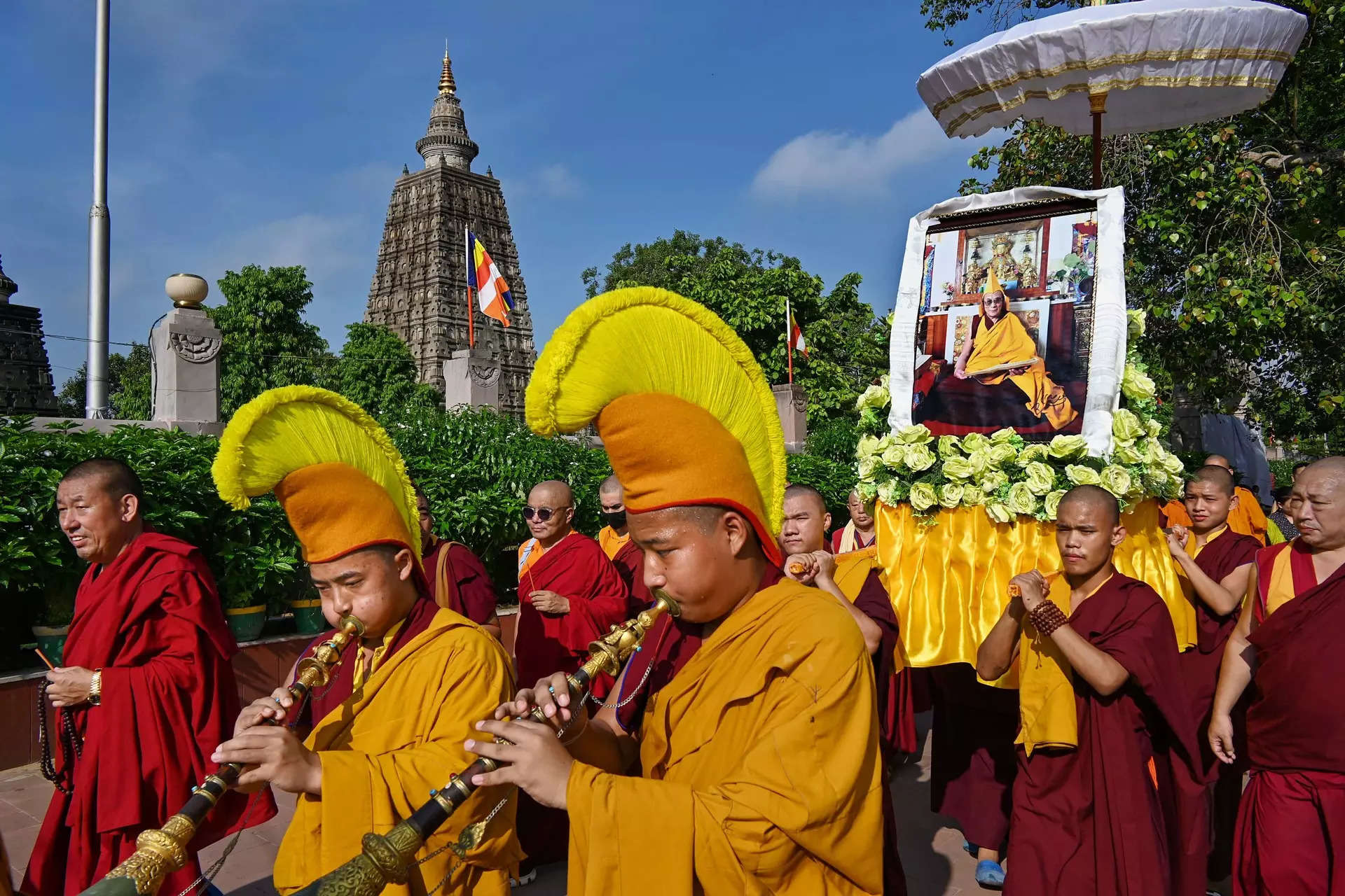 <p>Bodh Gaya: Buddhist devotees during the 88th birthday celebrations of Tibetan spiritual leader the Dalai Lama, at Mahabodhi temple in Bodh Gaya. (PTI Photo)</p>