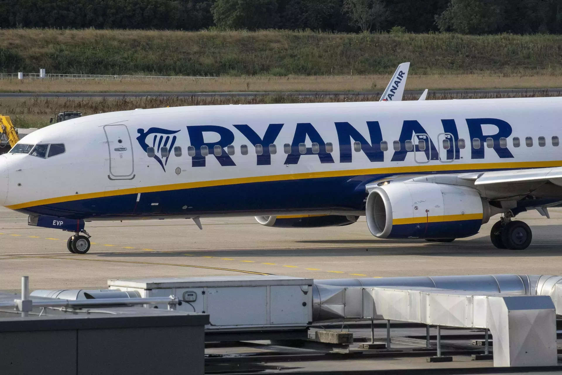 <p>A Ryanair airplane is seen on the tarmac of Charleroi Airport, during a second weekend strike of pilots of the airline, in Charleroi on July 29, 2023. A strike by Ryanair pilots in Belgium in an ongoing dispute over working conditions has cancelled 96 flights to and from Charleroi this weekend, the airport said on July 29, in the midst of the busy summer travel season. - Belgium OUT</p><p> (Photo by NICOLAS MAETERLINCK / BELGA / AFP)</p>