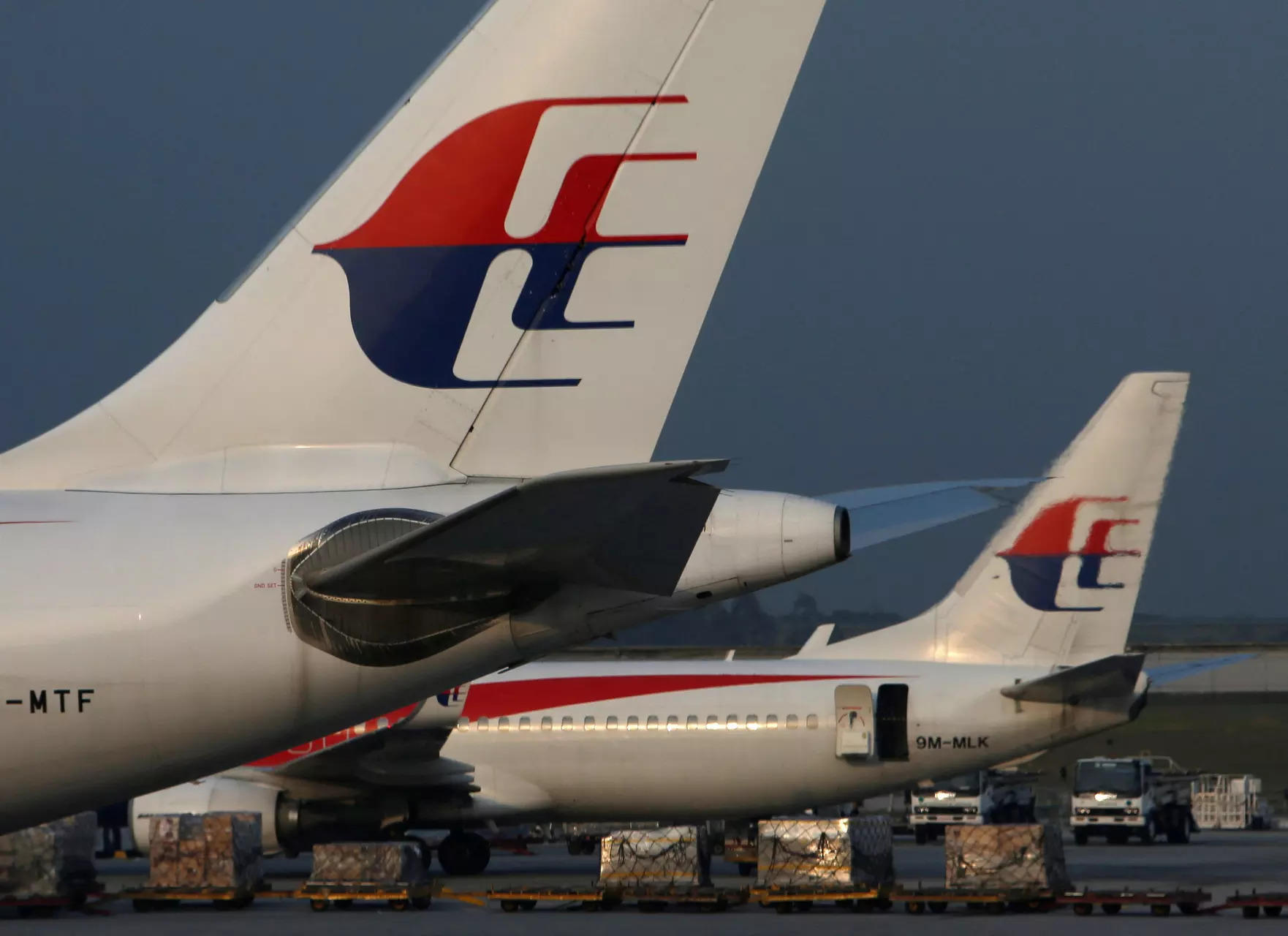 <p>Malaysia Airlines planes sit on the tarmac at Kuala Lumpur International Airport July 21, 2014.</p>