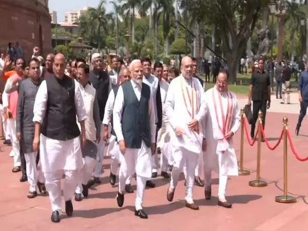 New Parliament Building Modi's Speech: Led by Modi, Amit Shah, Members of  Parliament march to new Parliament building, ET Government