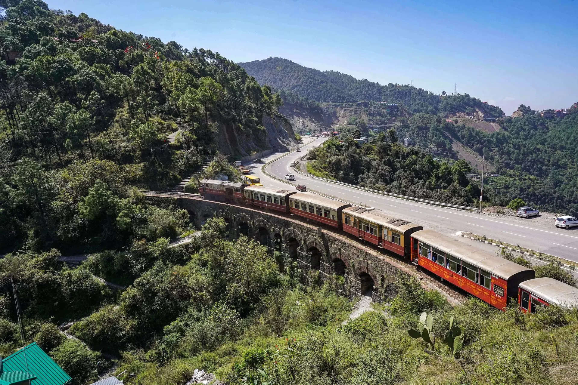 <p>A Toy train runs on Kalka-Shimla heritage railway track as train services resume after more than a month of their suspension due to damaged railway tracks caused by heavy rainfall and landslides, in Shimla. (PTI Photo)</p>