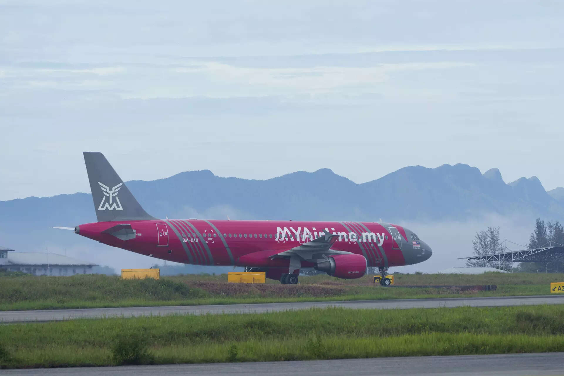 <p>An Airbus A320-200 plane operate by Malaysian budget carrier MYAirline taxing at Miri airport in Kuching, Malaysia, on March 26, 2023. Malaysian budget carrier MyAirline abruptly suspended operations Thursday, citing financial pressures less than 11 months after it took to the skies. The unexpected announcement on social media caught many by surprise and left angry passengers stranded at the airport.(AP Photo/Vincent Thian)</p>