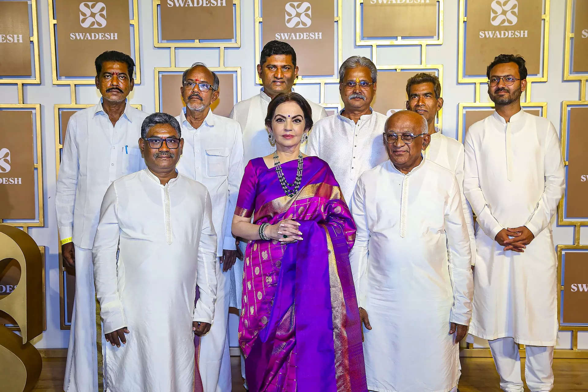 <p>Nita Ambani with master artisans at the inauguration of the Swadesh store, in Hyderabad. </p>