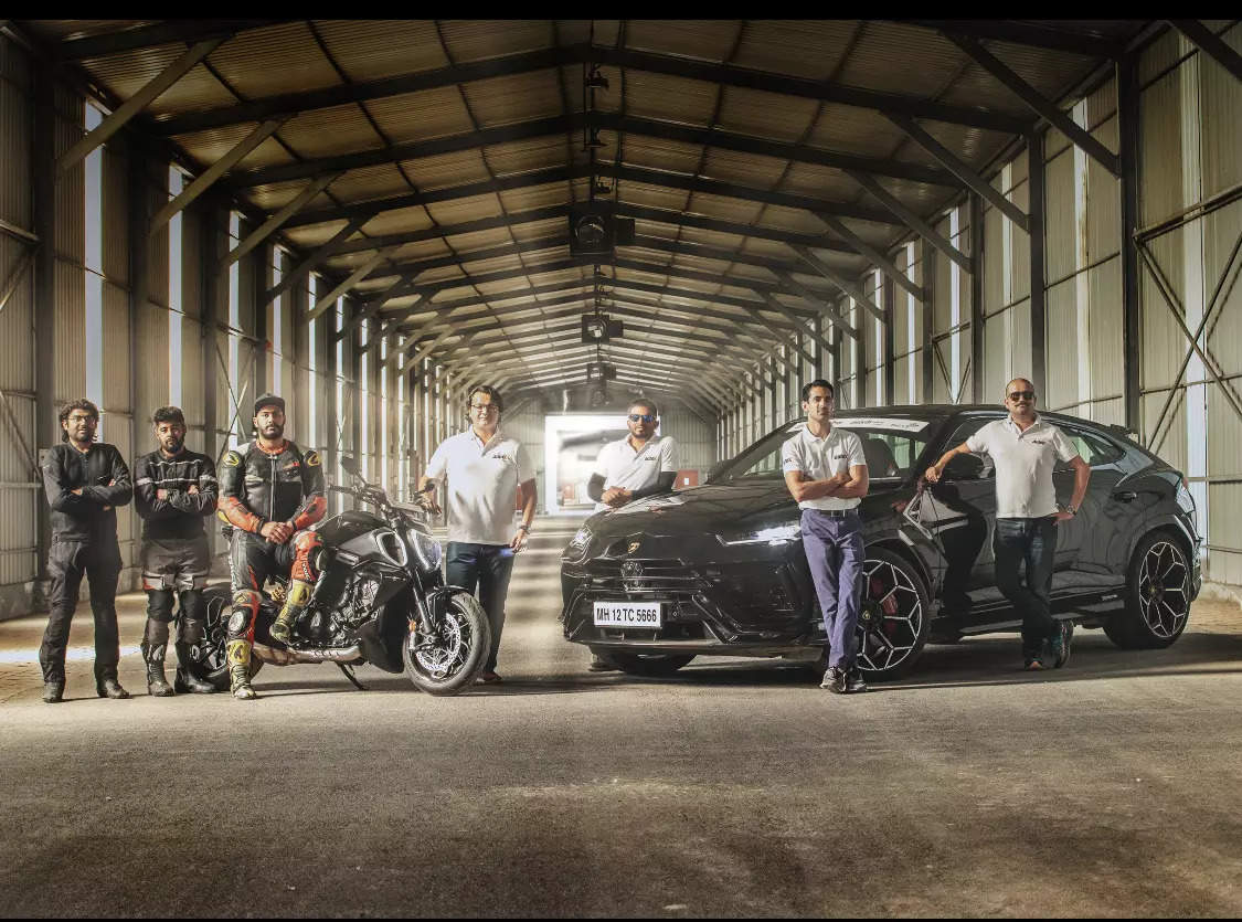 <p>(From L to R: Jury members Dhruv Paliwal, Karan Mathur, Simran King, Manav Sinha, Shivank Bhatt, Dhruv Behl and Ishan Raghava seen standing alongside a Ducati Diavel V4 and Lamborghini Urus Performante)</p>