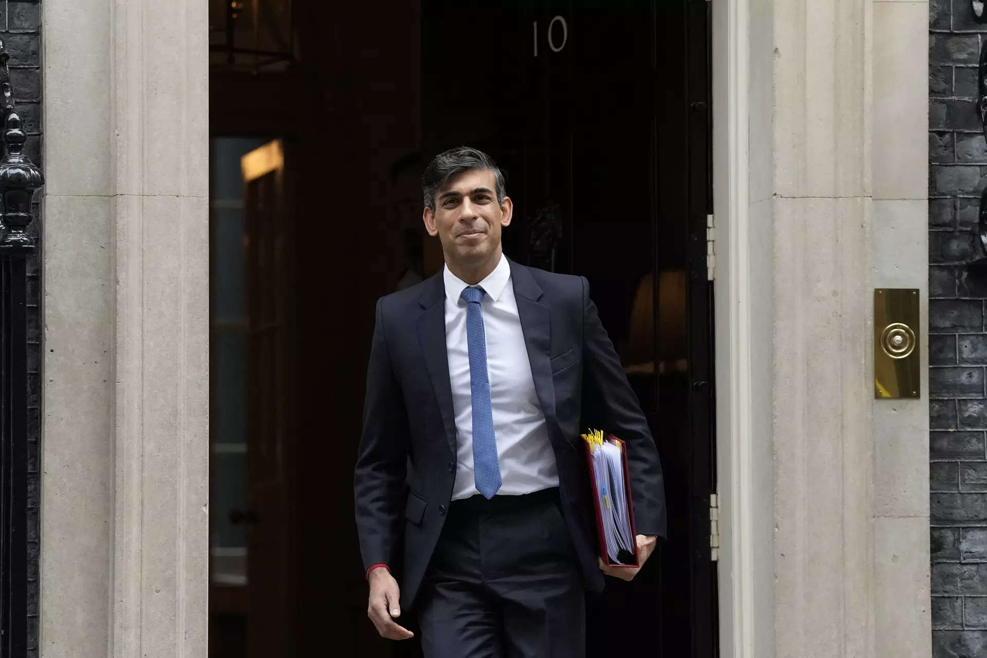 <p>Britain's Prime Minister Rishi Sunak leaves 10 Downing Street for his weekly Prime Ministers Questions at the House of Commons in London, Wednesday, Nov. 22, 2023. (AP Photo/Frank Augstein)</p>