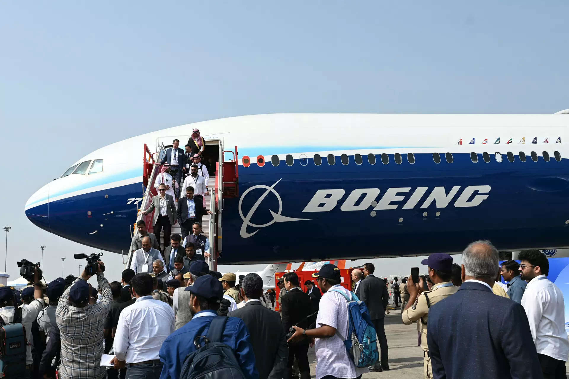 <p>Visitors gathered near a Boeing 777X aircraft displayed during the 'Wings India 2024', an exhibition and conference on civil aviation, at the Begumpet Airport in Hyderabad on January 18, 2024.</p>