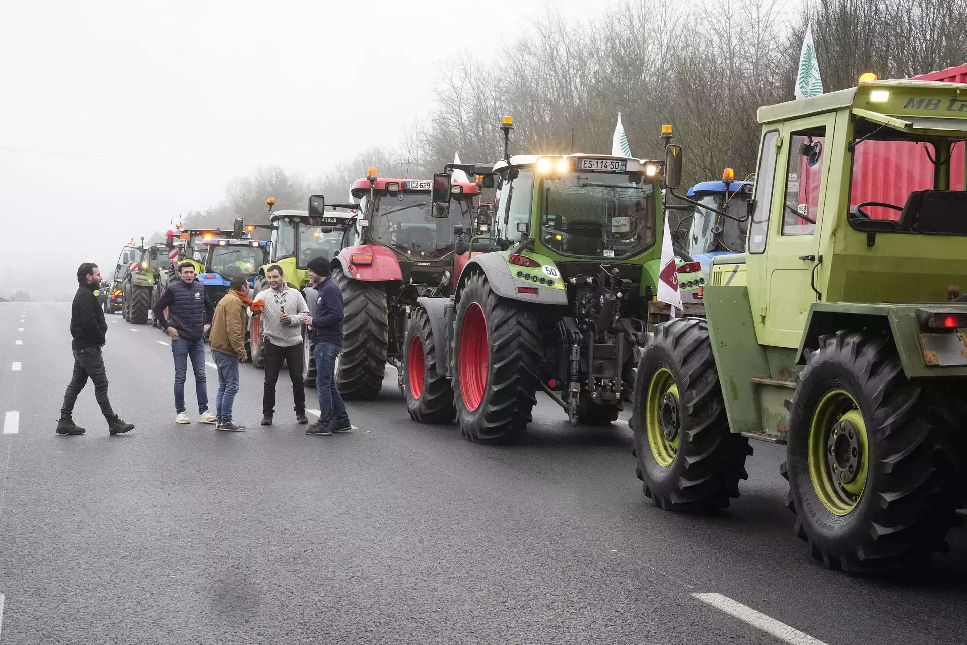 <p>Farmers stage a protest in Les Ulis, south of Paris. </p>
