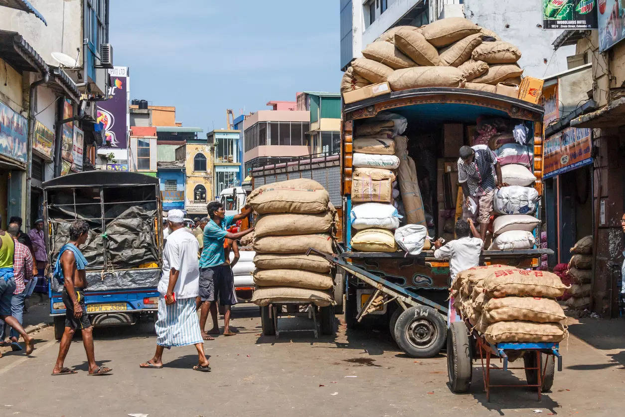 <p>Azadpur witnesses the arrival of hundreds of big and medium-sized vehicles every day carrying nearly 12,000 tonnes of goods.</p>