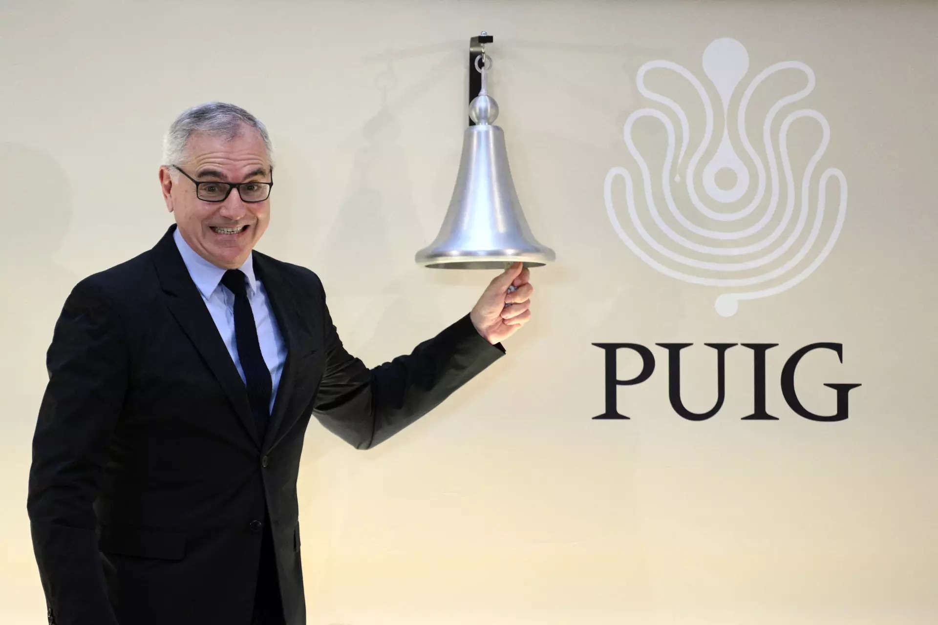 <p>CEO of Spanish fashion and beauty group Puig, Marc Puig, rings the bell during the initial public offerings of the company on May 3, 2024 in Barcelona. The iconic Nina Ricci, Paco Rabanne and Jean-Paul Gaultier labels make their market debut today as Spanish fashion and beauty group Puig begins trading on the Madrid stock exchange.</p>