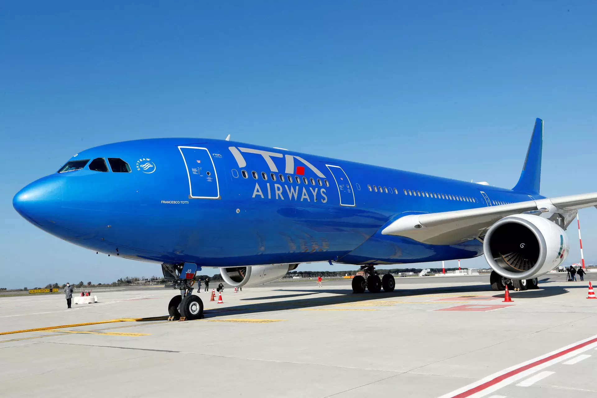 <p>FILE PHOTO: A new Italia Trasporto Aereo (ITA) plane with the state airline's blue livery is seen at Fiumicino airport before a news conference to present the new fleet, in Rome, Italy, March 1, 2022. REUTERS/Remo Casilli/File Photo</p>