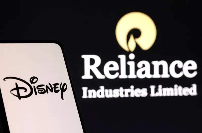 

<p>Disney and Reliance logos</p>
<p>“/><figcaption class=