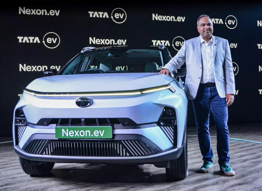 <p>Shailesh Chandra with Tata Nexon EV </p>