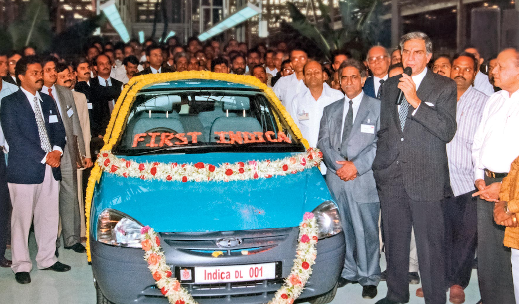 <p>Ratan Tata with Indica</p>