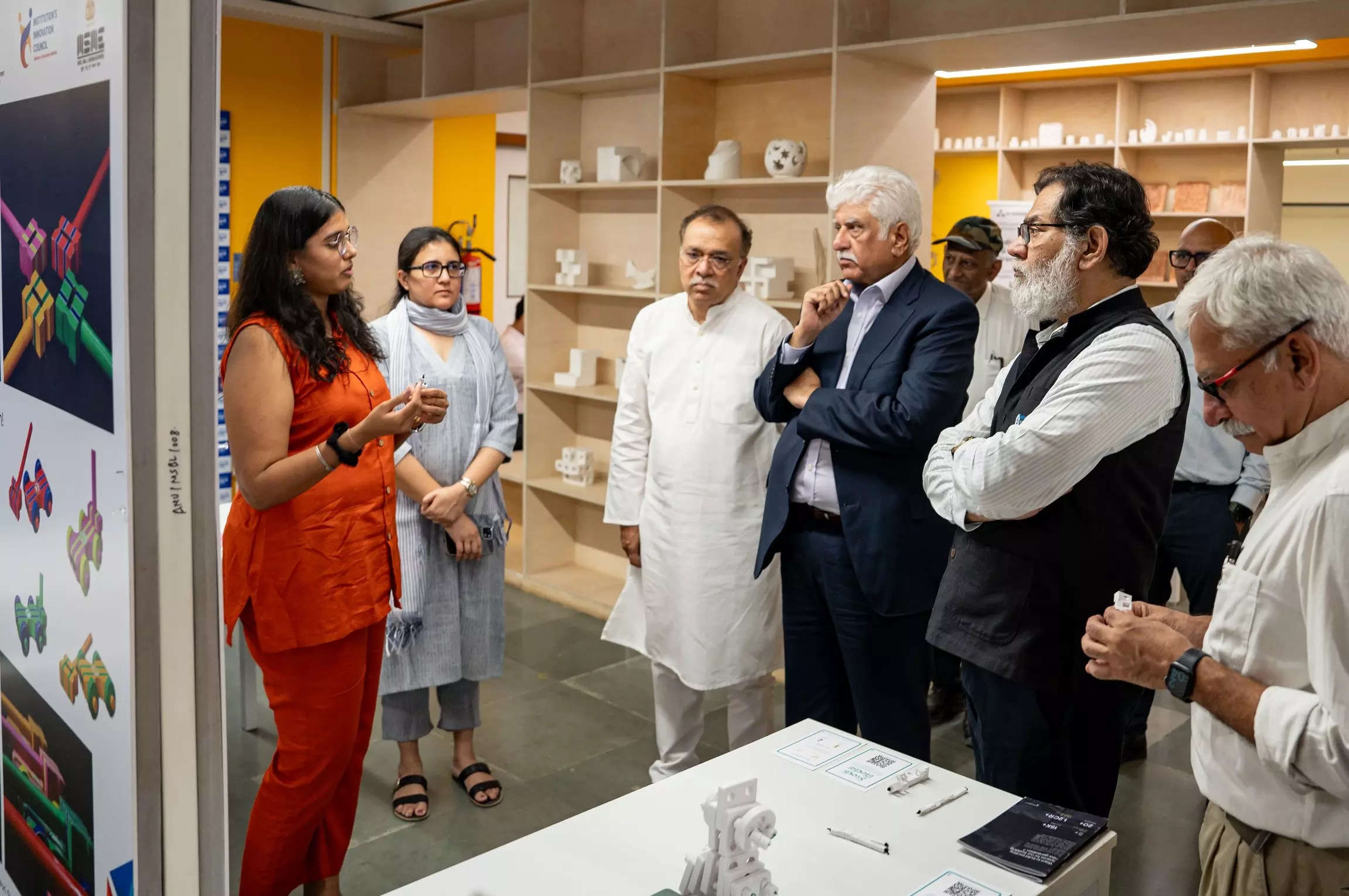 <p>Rakesh Bharti Mittal and Ajay Piramal interact with student innovators at Anant National University, Ahmedabad, on Wednesday.</p>