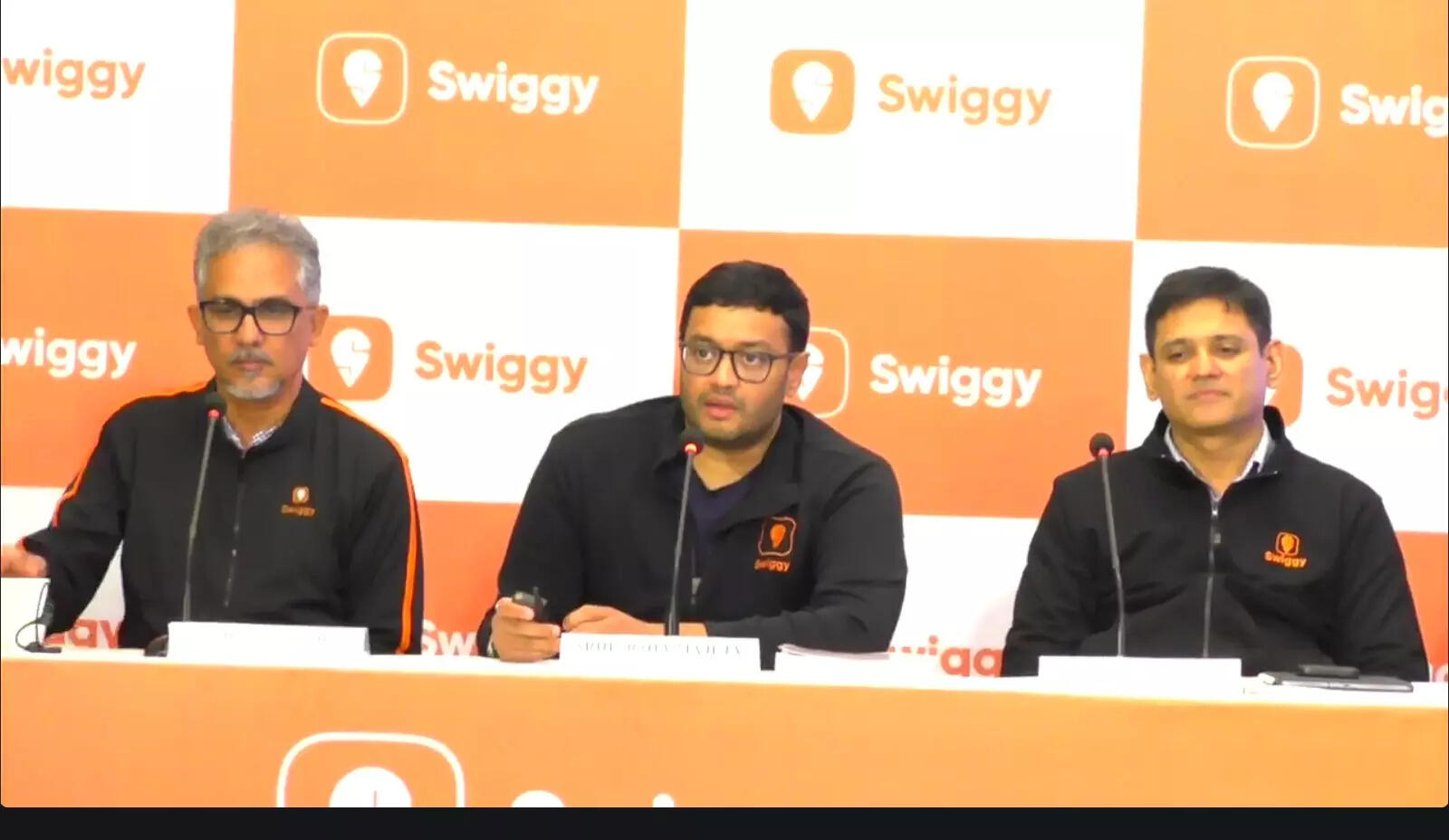 <p>Swiggy group CEO Sriharsha Majety (centre) with Rohit Kapoor, CEO of food delivery (left) and CFO Rahul Bothra</p>