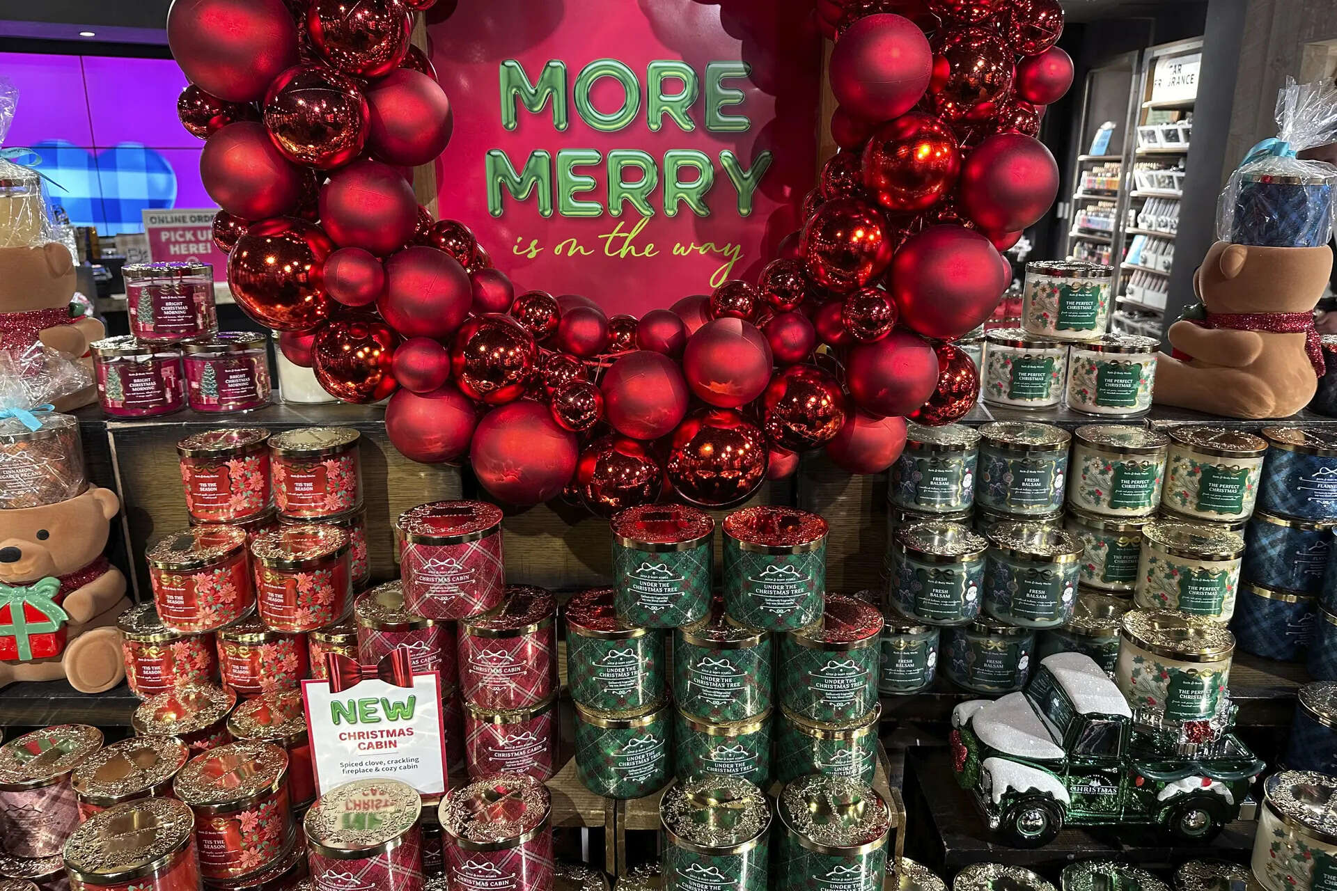 <p>An arrangement of holiday themed scented candles is shown at a Bath and Body Works store on Wednesday, Oct. 9, 2024, in New York. (AP Photo/Peter Morgan)</p>