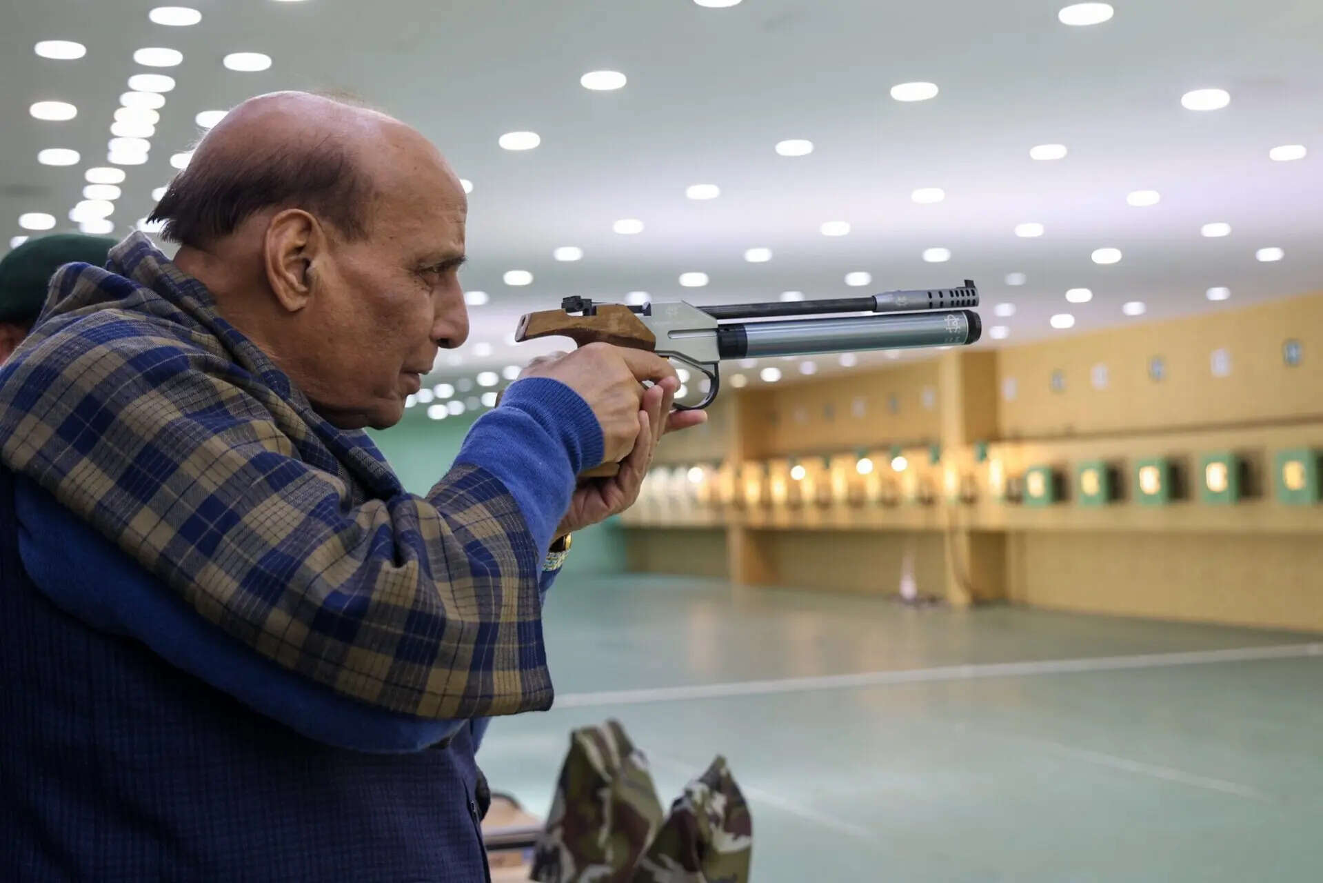 <p>Defence Minister Rajnath Singh at the ‘Vijay Shooting Range’ in Mhow, Indore district, during a visit on Sunday. (PTI Photo)</p>