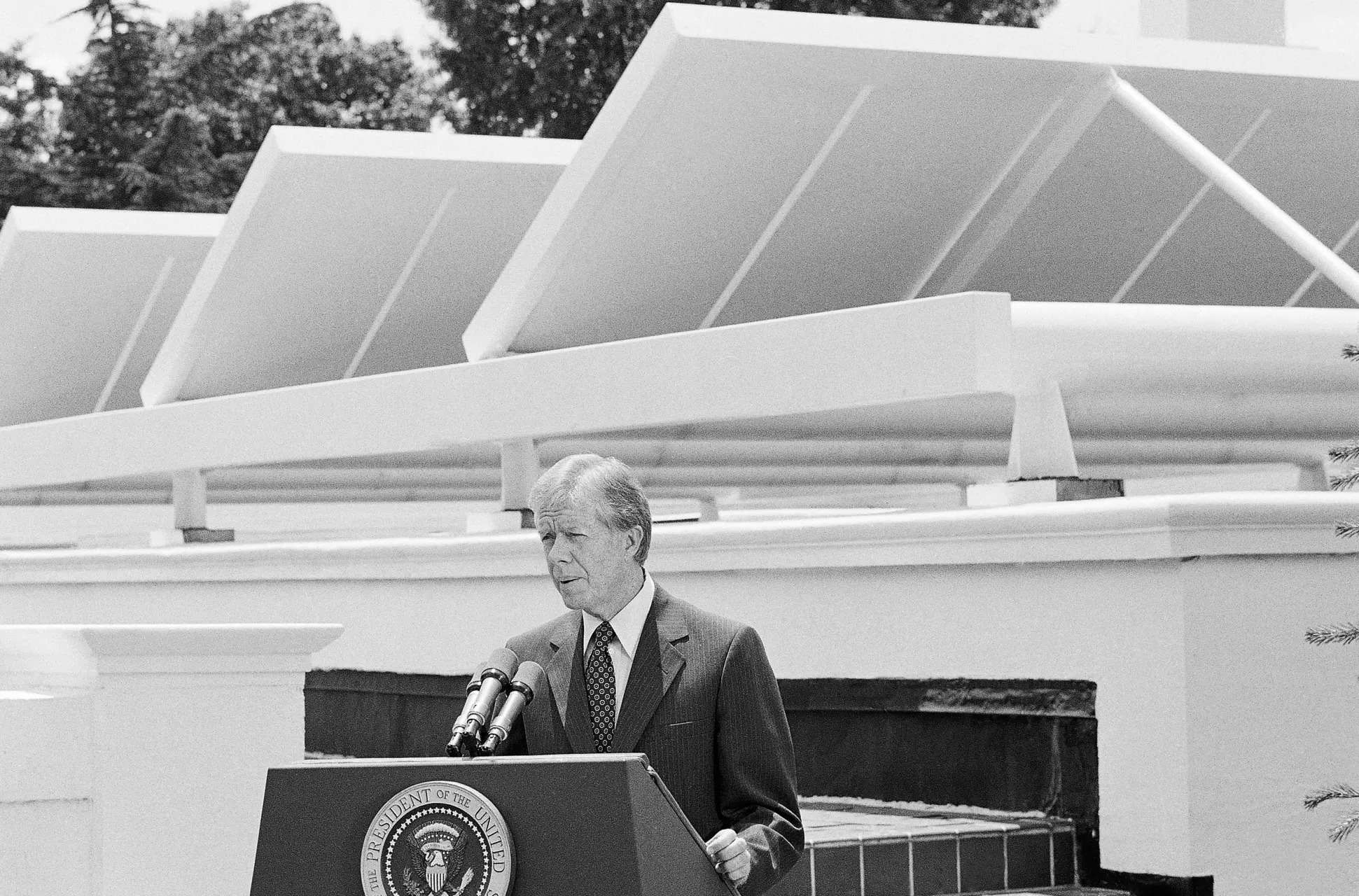 <p>FILE - President Jimmy Carter speaks against a backdrop of solar panels at the White House, June 21, 1979, in Washington. (AP Photo/Harvey Georges, File)</p>