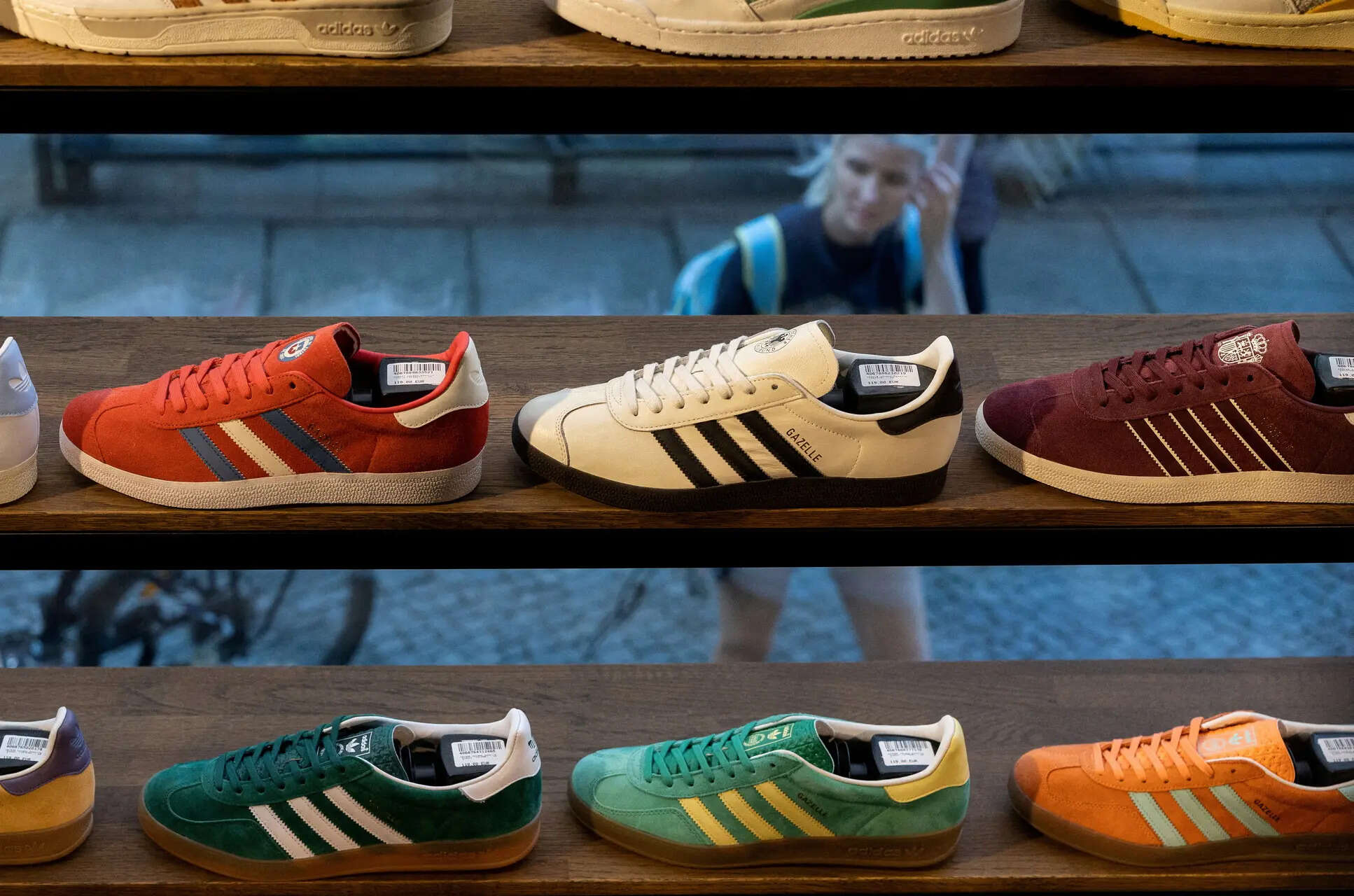 

<p> Adidas Gazelle sneakers for sale are illustrated in the shop (file image)</p>
<p>“/><figcaption class=