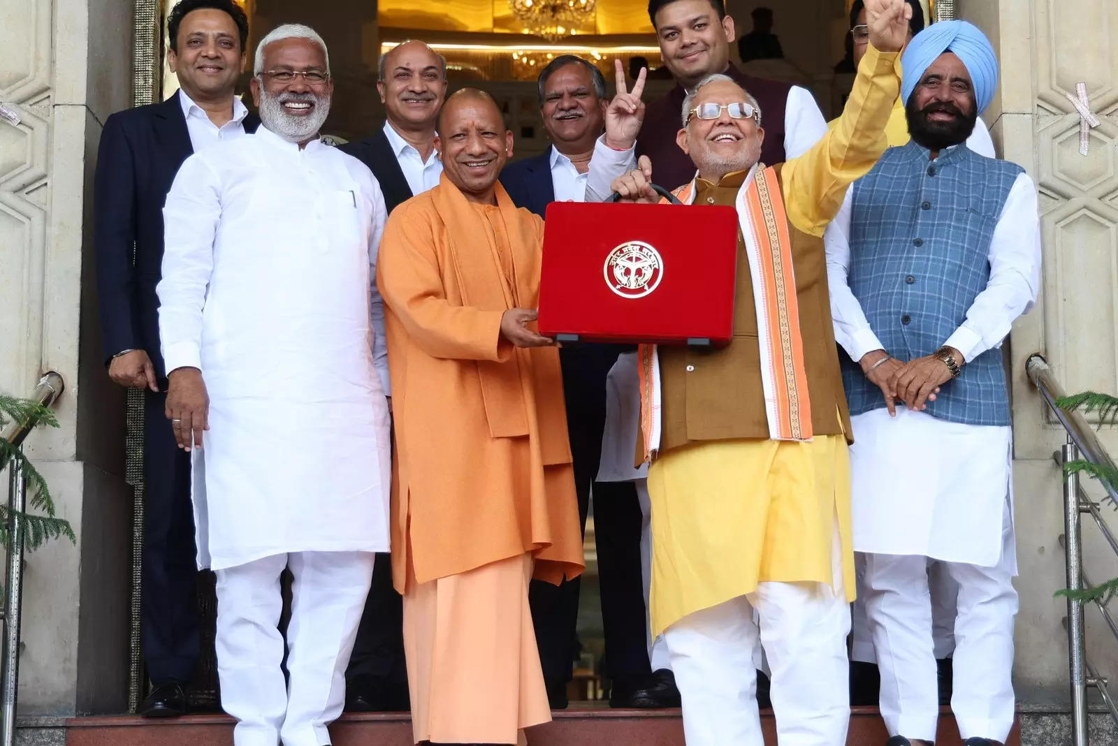 <p>Uttar Pradesh Chief Minister Yogi Aditynath and Finance Minister Suresh Khanna with the Budget 2025-26 bag before presentation in the Assembly in Lucknow on Thursday. </p>