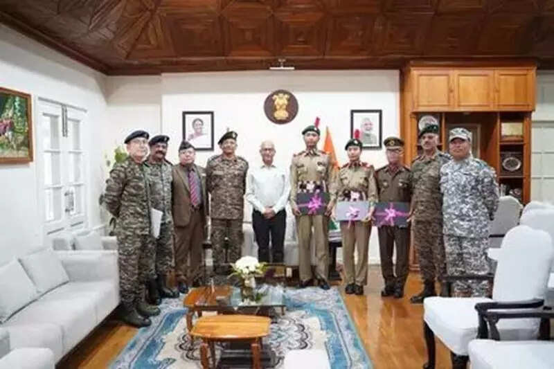 <p>A team of officials led by Rashtriya Raksha University's in-charge Director Avinash Kharel on Tuesday met Manipur Governor Ajay Kumar Bhalla at Raj Bhavan in Imphal and discussed the varsity's outreach and academic activities.</p>