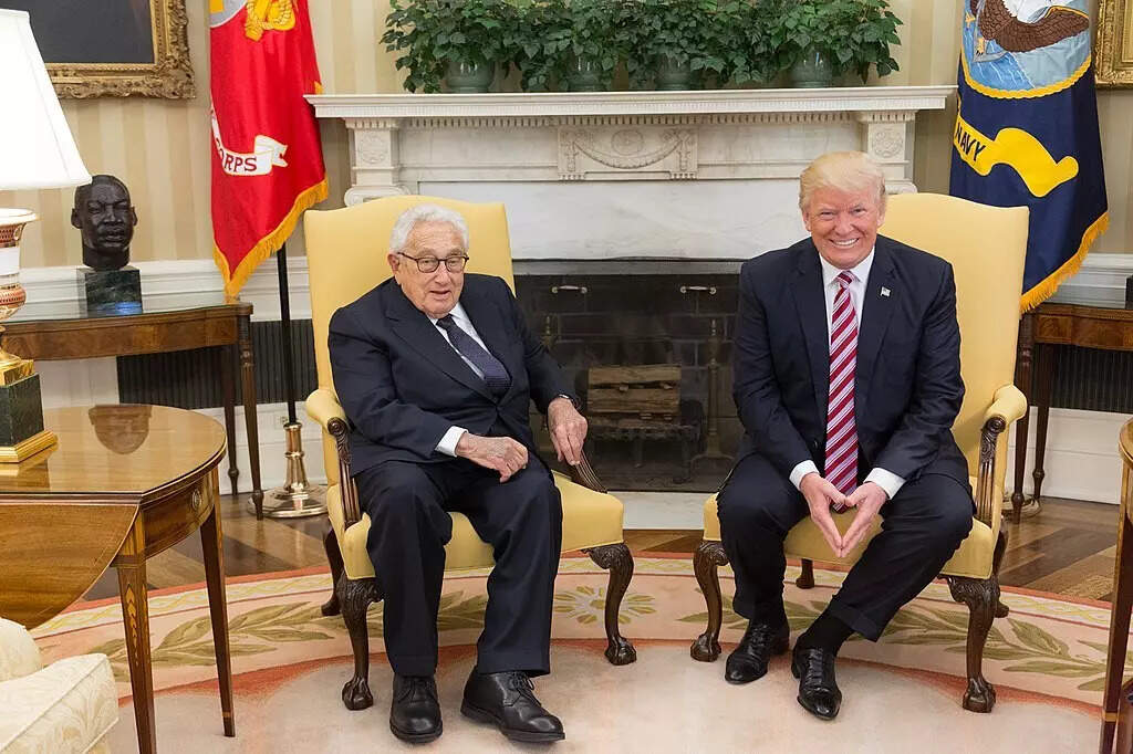 <p>President Donald Trump meeting with Kissinger on May 10, 2017</p>