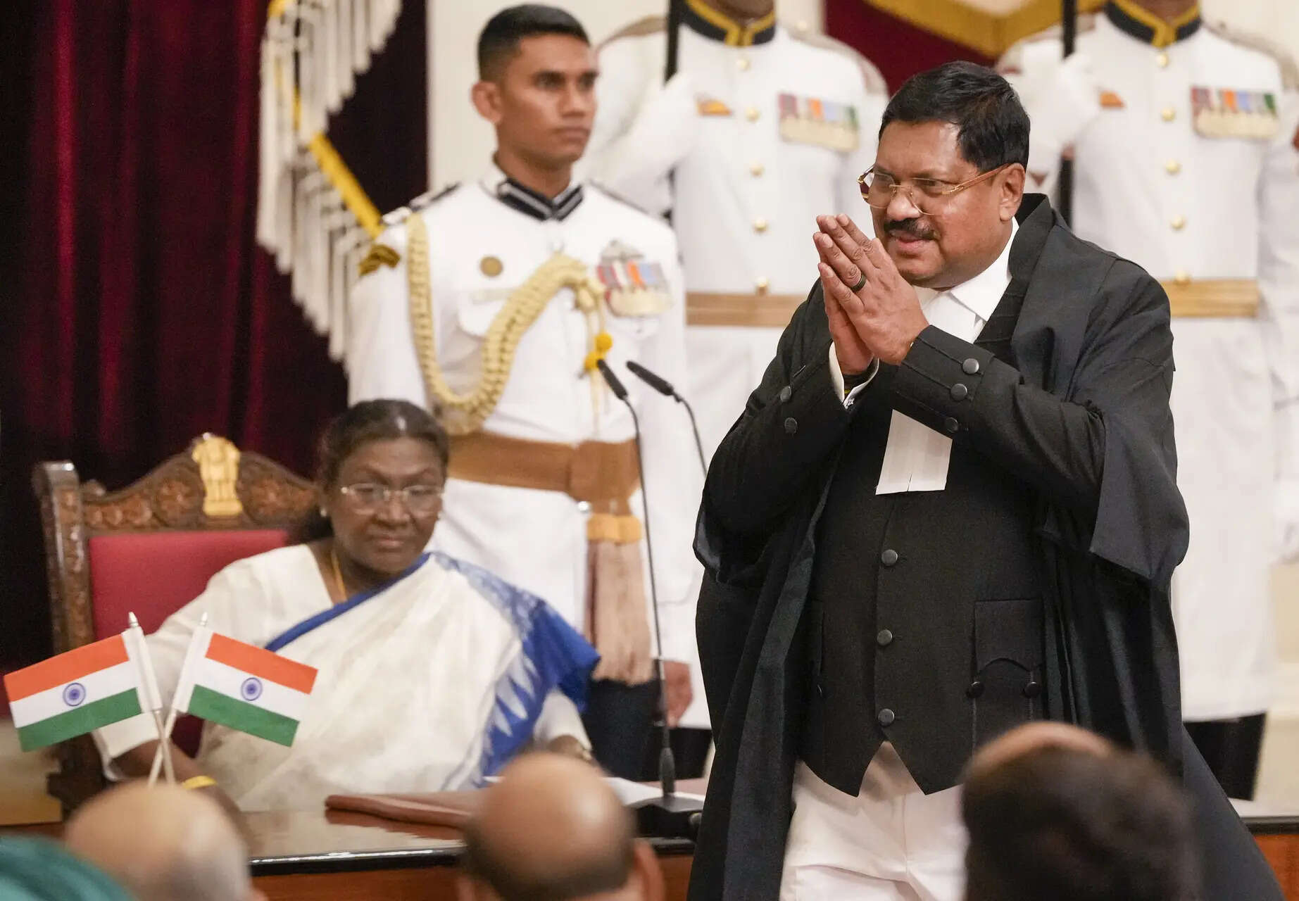 <p>President Droupadi Murmu looks on as Justice Bhushan Ramkrishna Gavai greets the audience after he took oath as the 52nd Chief Justice of India during a ceremony, at Rashtrapati Bhavan in New Delhi. (PTI Photo/Ravi Choudhary)</p>