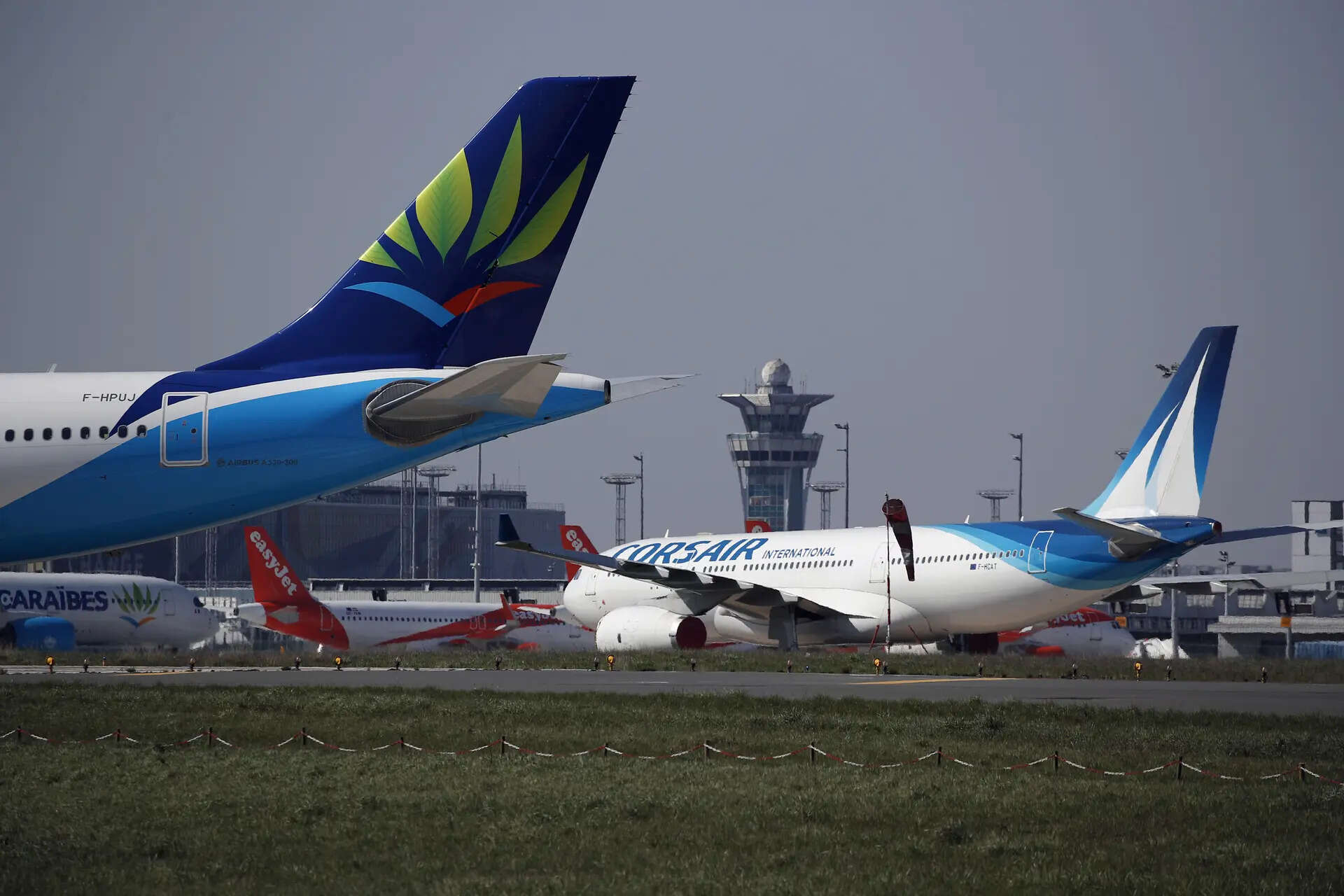 <p> Airplanes are parked on the tarmac at the international airport of Orly, in Orly, south of Paris, Wednesday, April 1, 2020. </p>