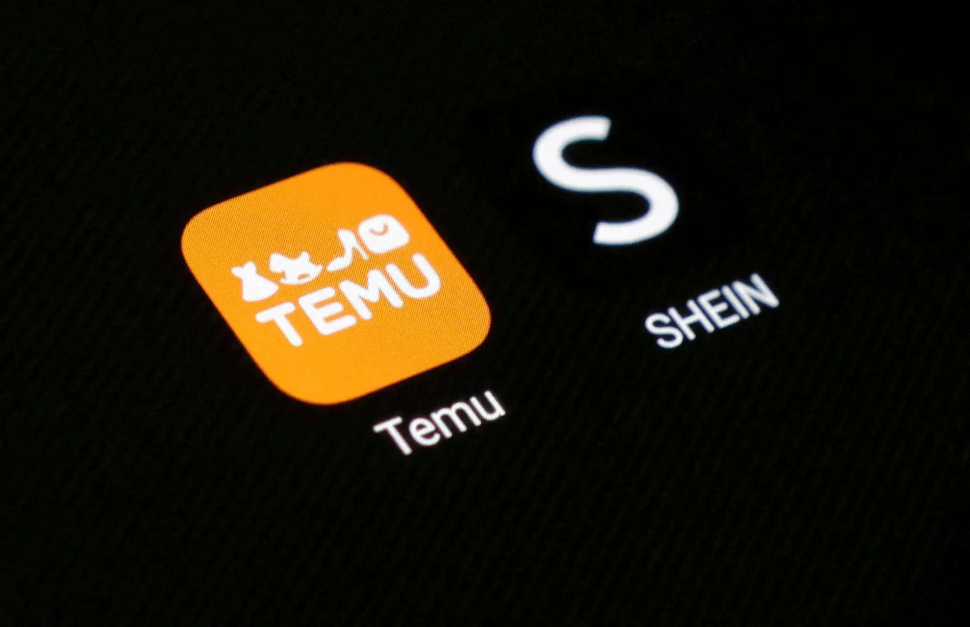 <p>Illustration shows Shein and Temu app icons</p>
