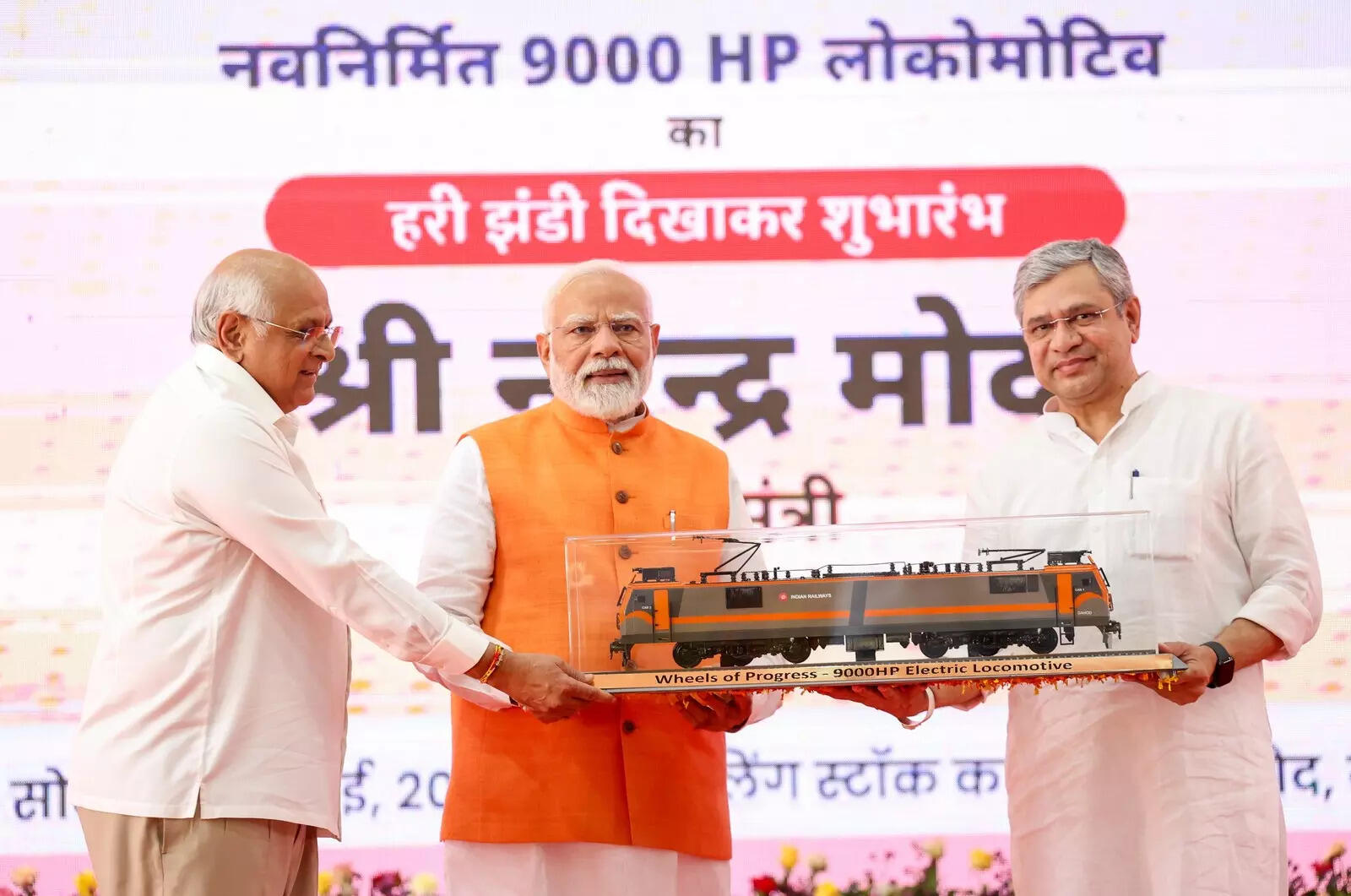 <p>Prime Minister Narendra Modi, Union Railways Minister Ashwini Vaishnaw, and Gujarat Chief Minister Bhupendra Patel during the flagging off ceremony at Dahod</p>