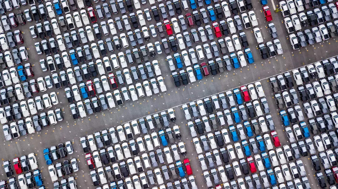 India’s auto sector faces a growing inventory pile-up, with unsold vehicles worth ₹52,000 crore at dealerships, highlighting a retail-wholesale disconnect.