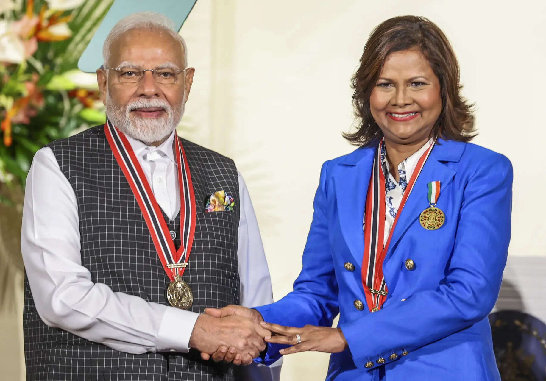 Prime Minister Narendra Modi being conferred with 'The Order of the Republic of Trinidad and Tobago' - the country's highest civilian honour, by Trinidad and Tobago President Christine Carla Kangaloo during a ceremony at the President's House, in Trinidad and Tobago.