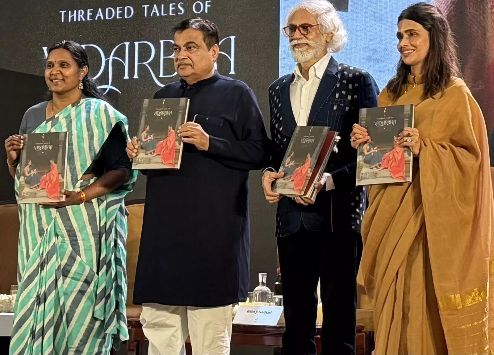 <p>Launch of Threaded Tales of Vidarbha. Left to right: Dr. M. Beena, Development Commissioner (Handlooms), Ministry of Textiles, Union Minister Nitin Gadkari, Designer Shruti Sancheti, Sunil Sethi, Chairman, Fashion Design Council of India</p>