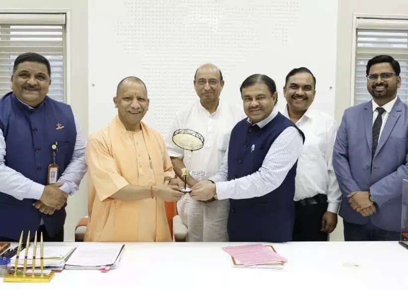 <p>Dr. Nilesh M. Desai with the Chief Minister of Uttar Pradesh</p>