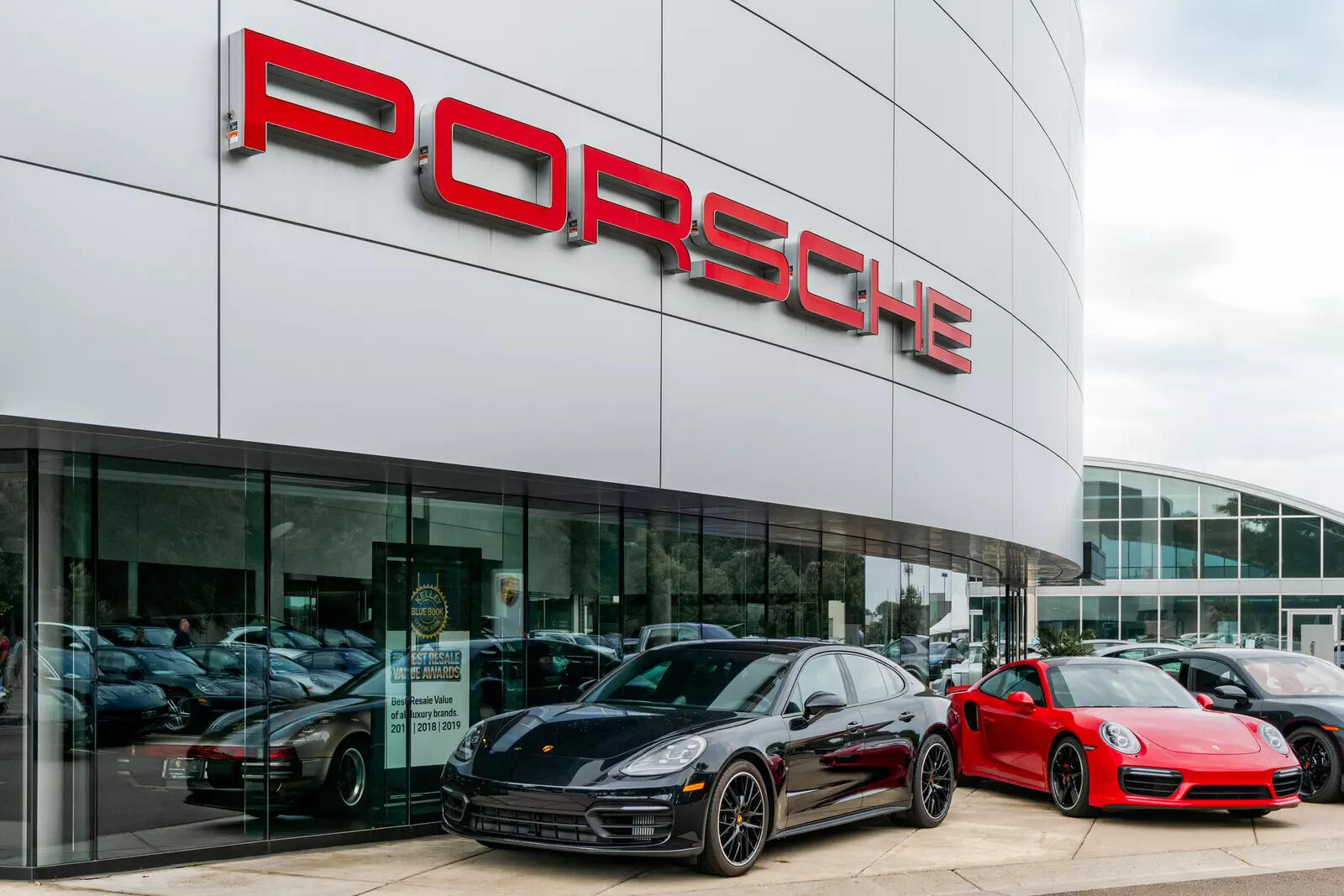 

<p>Porsche shares fall as EV rollout slows, profit outlook cut</p>
<p>“/><figcaption class=