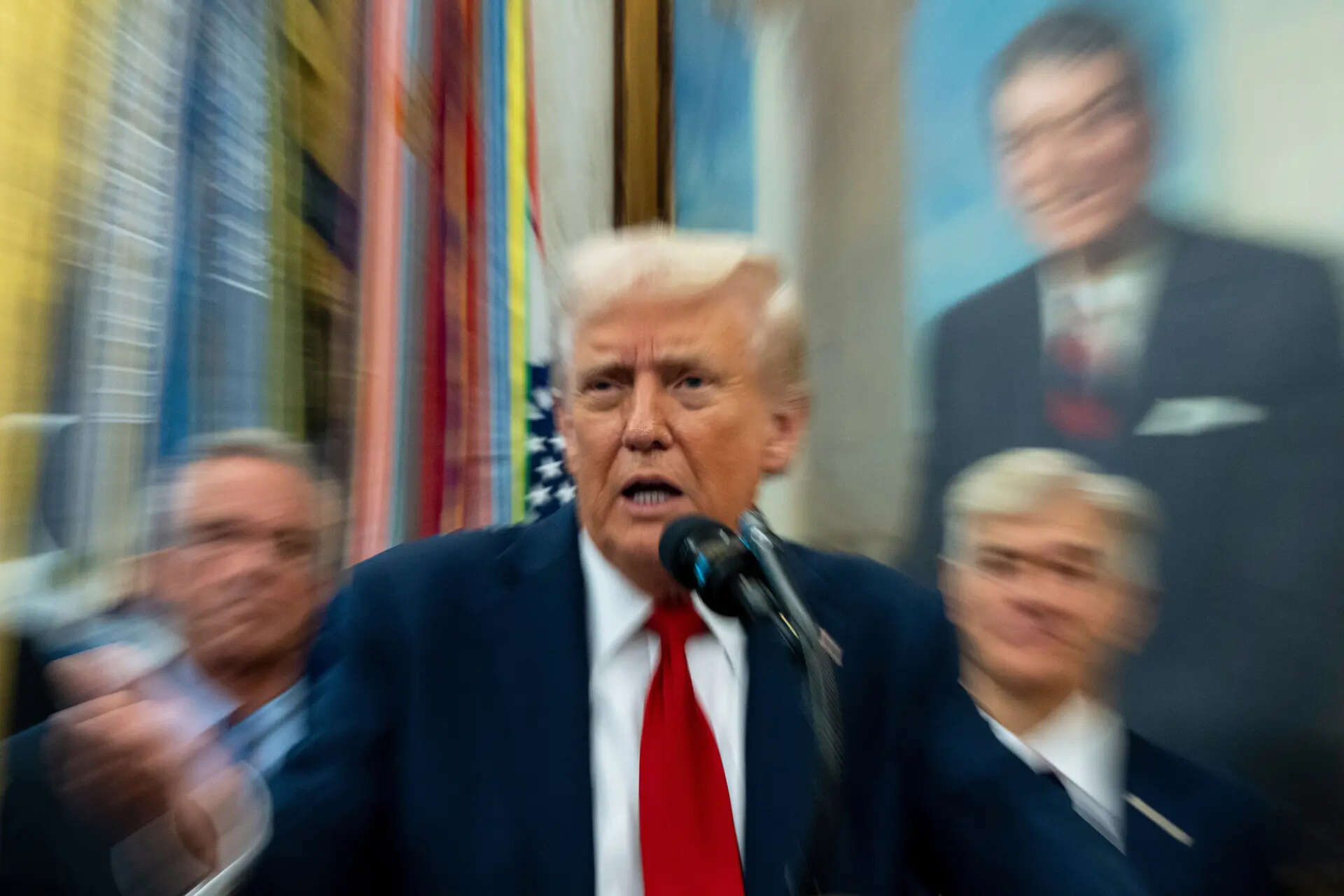 <p>In this photo made with a slow shutter speed, President Donald Trump speaks in the Oval Office of the White House, Tuesday, Sept. 30, 2025, in Washington. (AP Photo/Alex Brandon)</p>