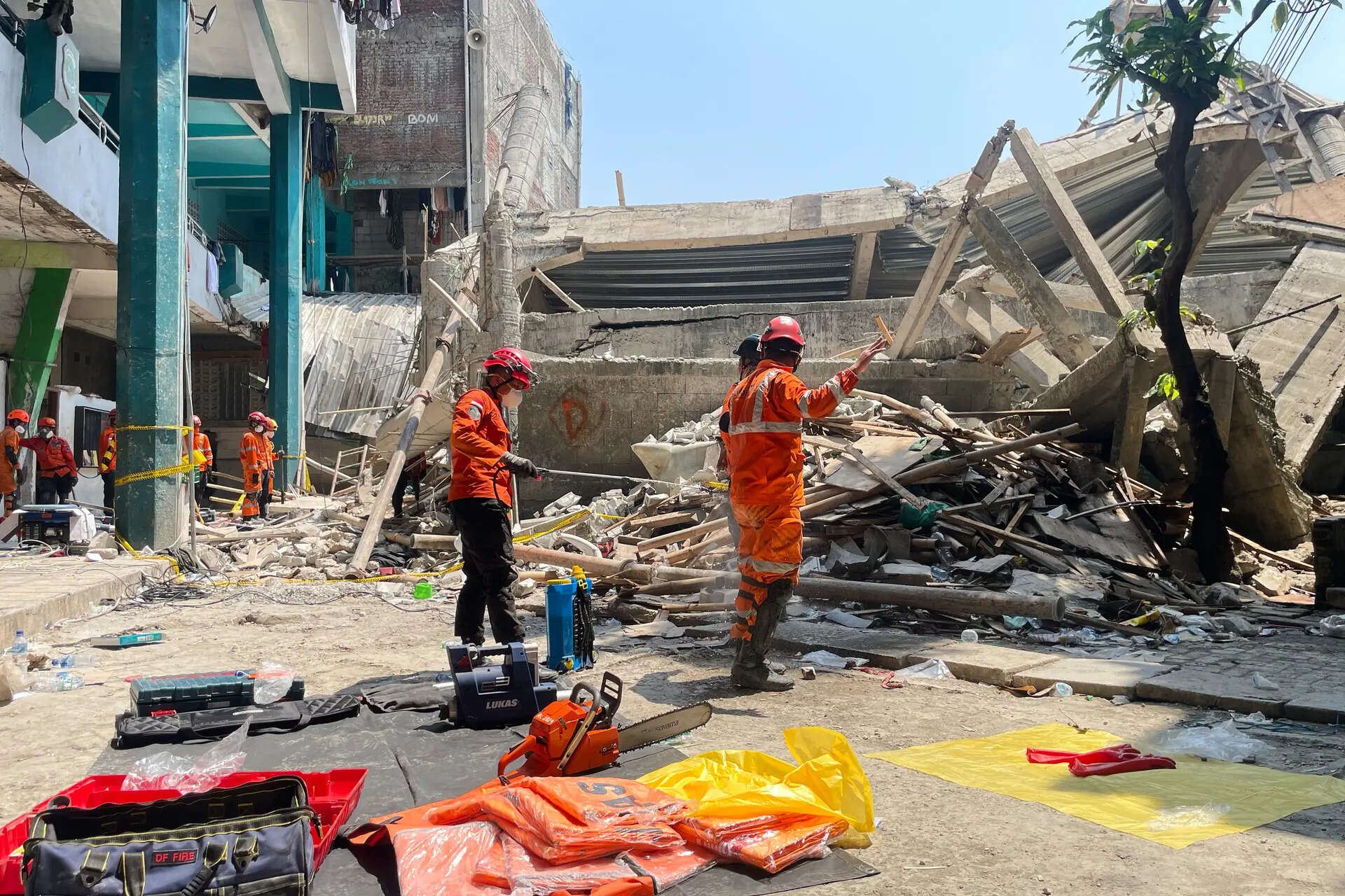 <p>Part of the multi-storey building on Indonesia's Java island collapsed suddenly last week as students gathered for afternoon prayers</p>