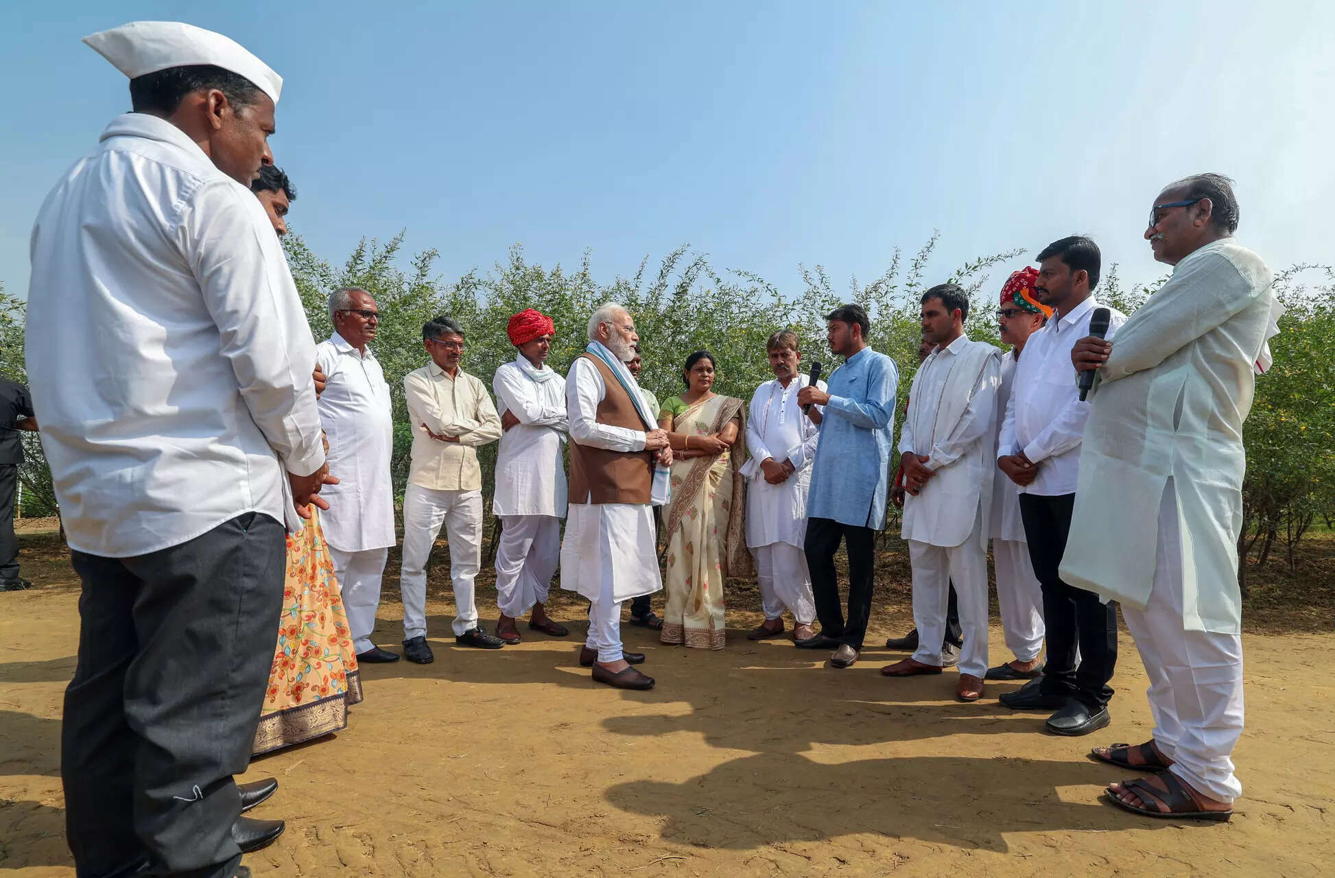 Prime Minister Narendra Modi interacts with farmers during the Special Krishi Programme at the Indian Agricultural Research Institute.