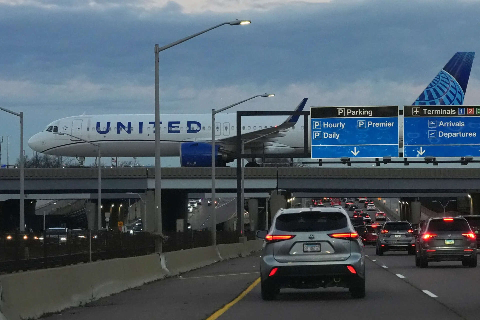 <p>An United Airlines flight arrives at O'Hare International Airport in Chicago</p>