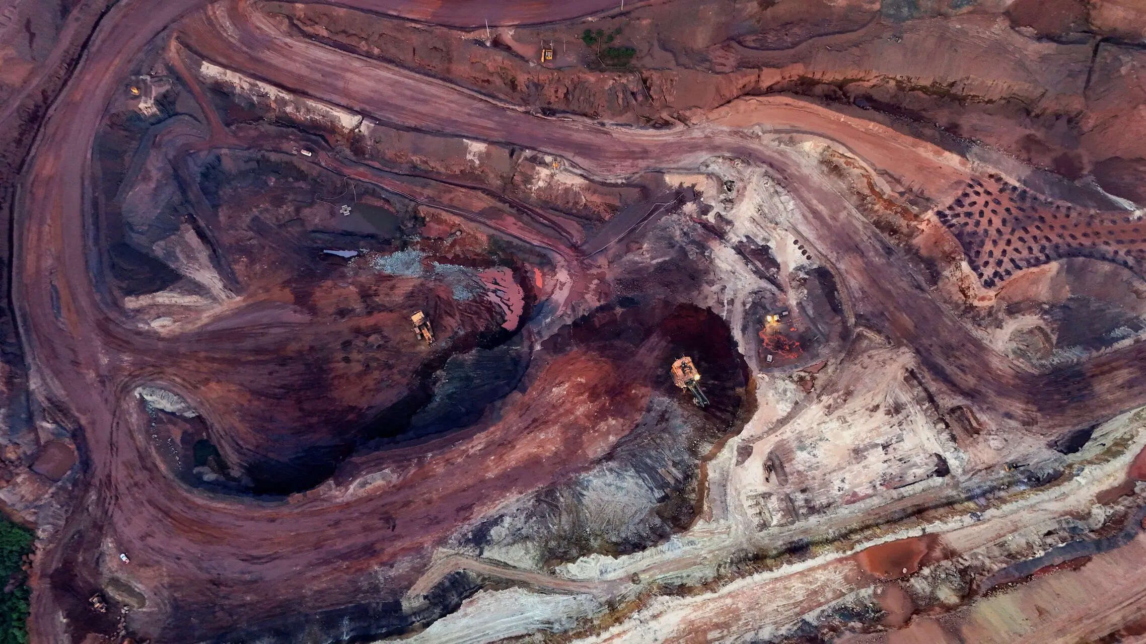 Chinas producer price deflation eased in October and consumer prices returned to positive territory, as the government stepped up efforts to curb over-capacity and cut-throat competition among firms.