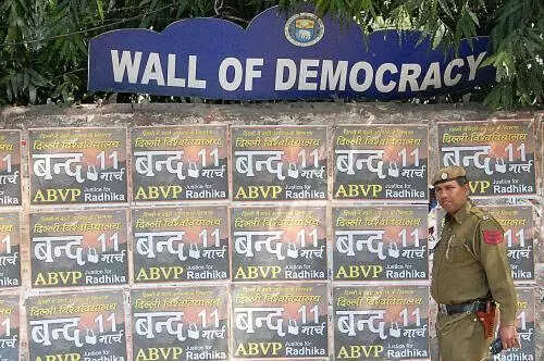 <p>A video shows at least seven security staff stopping the duo</p>