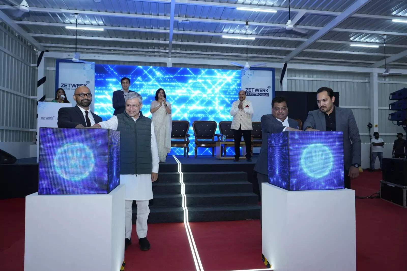 <p>Left: Rahul Sharma, Co-founder, Zetwerk, with Ashwini Vaishnaw, Union Minister for Electronics & Information Technology, Railways, and Information & Broadcasting.</p><p><br></p><p>Right: M B Patil, Minister for Large & Medium Industries, Government of Karnataka, with Ankit Fatehpuria, Co-founder & CFO, Zetwerk.</p>