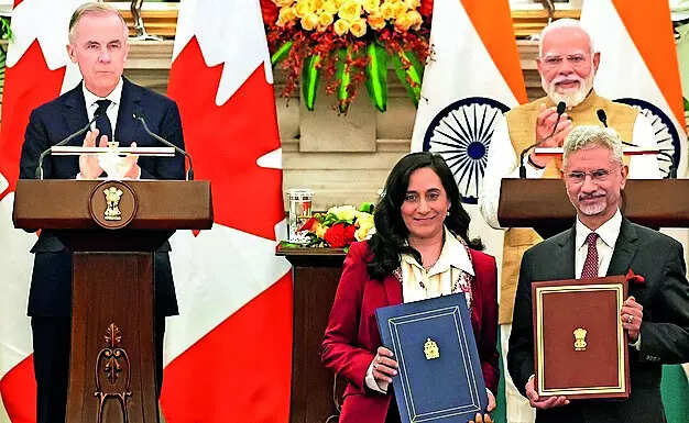 <p>India, Canada seal uranium deal; set $50bn trade target</p>