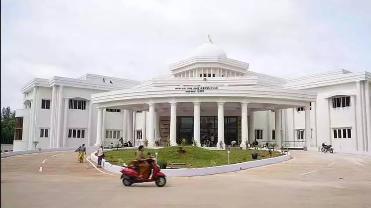 <p>State Higher Education Minister M C Sudhakar defended the government's decision to cancel the event saying public universities must remain apolitical and free from ideological influence</p>