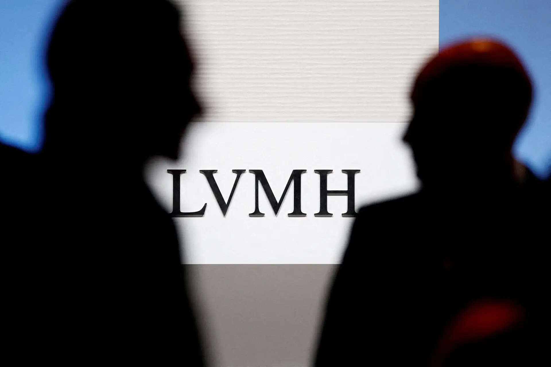 FILE PHOTO: A logo of LVMH Moet Hennessy Louis Vuitton is seen on a wall before the presentation of LVMH Moet Hennessy Louis Vuittons 2025 annual results in Paris, France, January 27, 2026. REUTERS/Benoit Tessier/File Photo